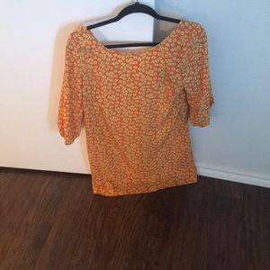 Orange floral tunic with bow in back